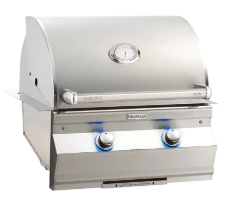 Stainless steel grill with 'Aurora' and 'Firemagic' branding