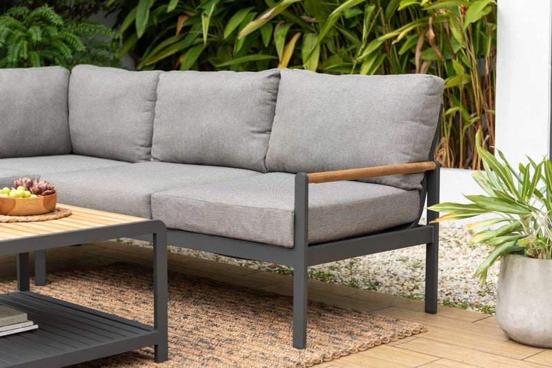 Gray outdoor sofa with wooden armrests