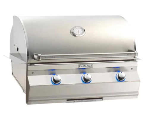 Stainless steel grill with 'Firemagic' branding