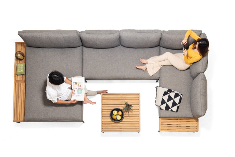  a sectional sofa with a small table 